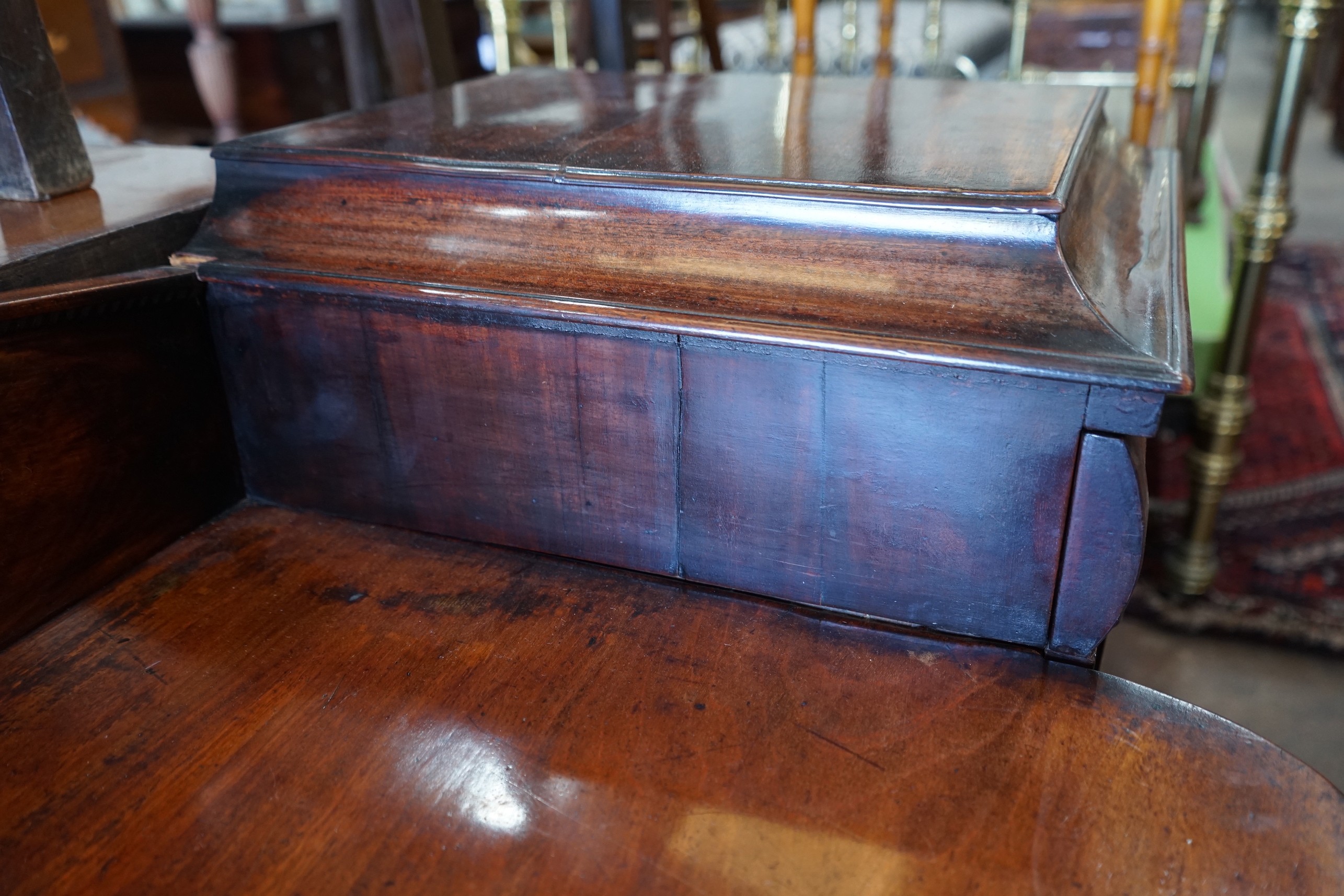 A Regency carved mahogany pedestal sideboard, length 186cm, depth 54cm, height 115cm